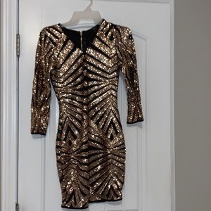 Cute gold/black mini dress